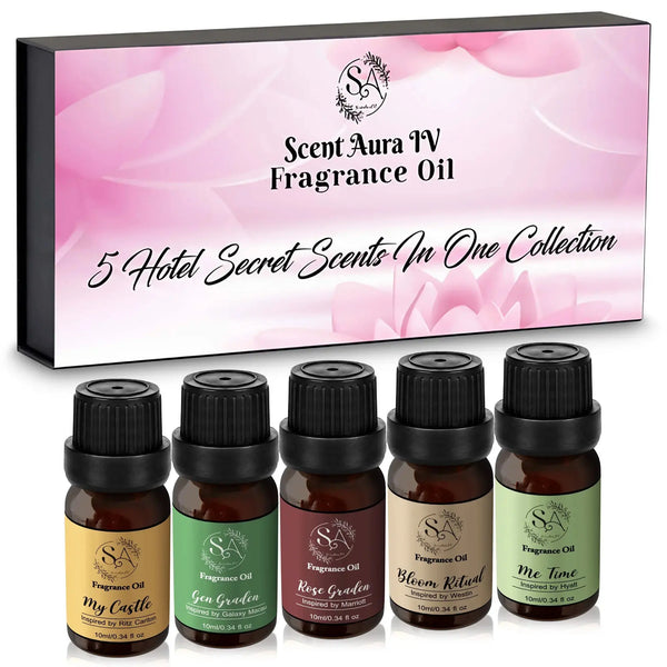 Set of five diffuser oil bottles with a branded box in the background