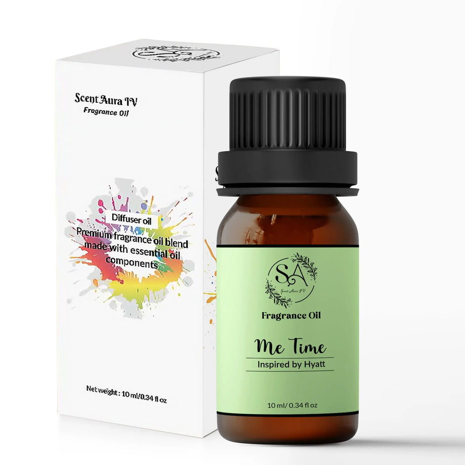Me Time Fragrance oil bottle with green label and black cap next to its packaging on a white background