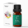 Fragrance oil bottle with green label and black cap next to its packaging on a white background